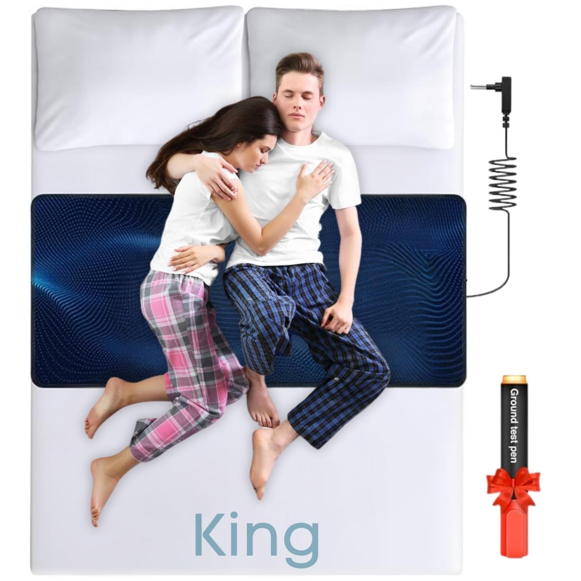 Top-down view of a couple sleeping on a king-size bed using a black grounding mat with a blue wave pattern, connected to a grounding wire and including a continuity ground test pen.